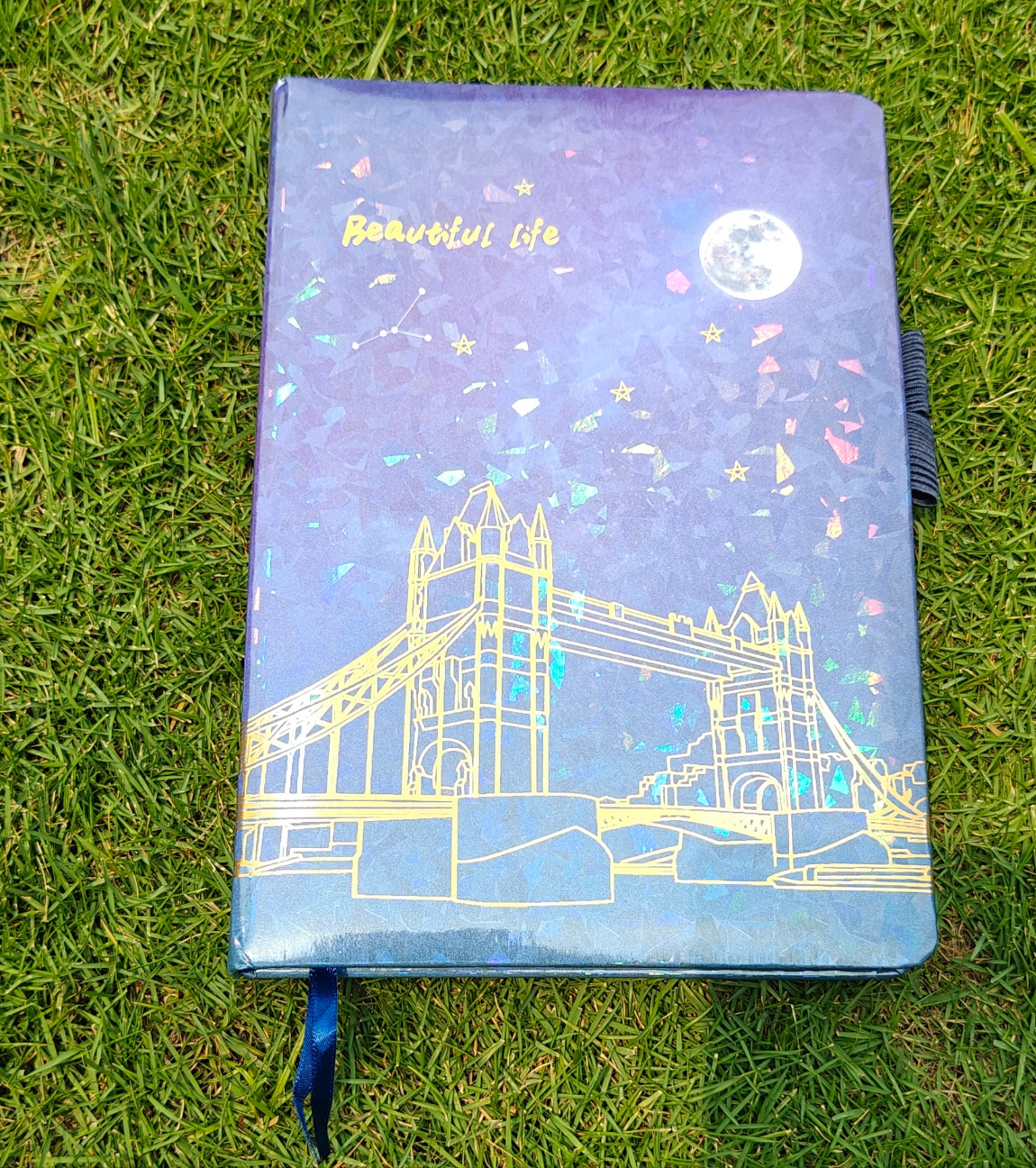 Holographic neon notebook