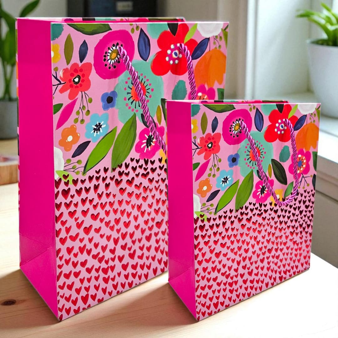 Goodie bag with red metallic hearts embossed