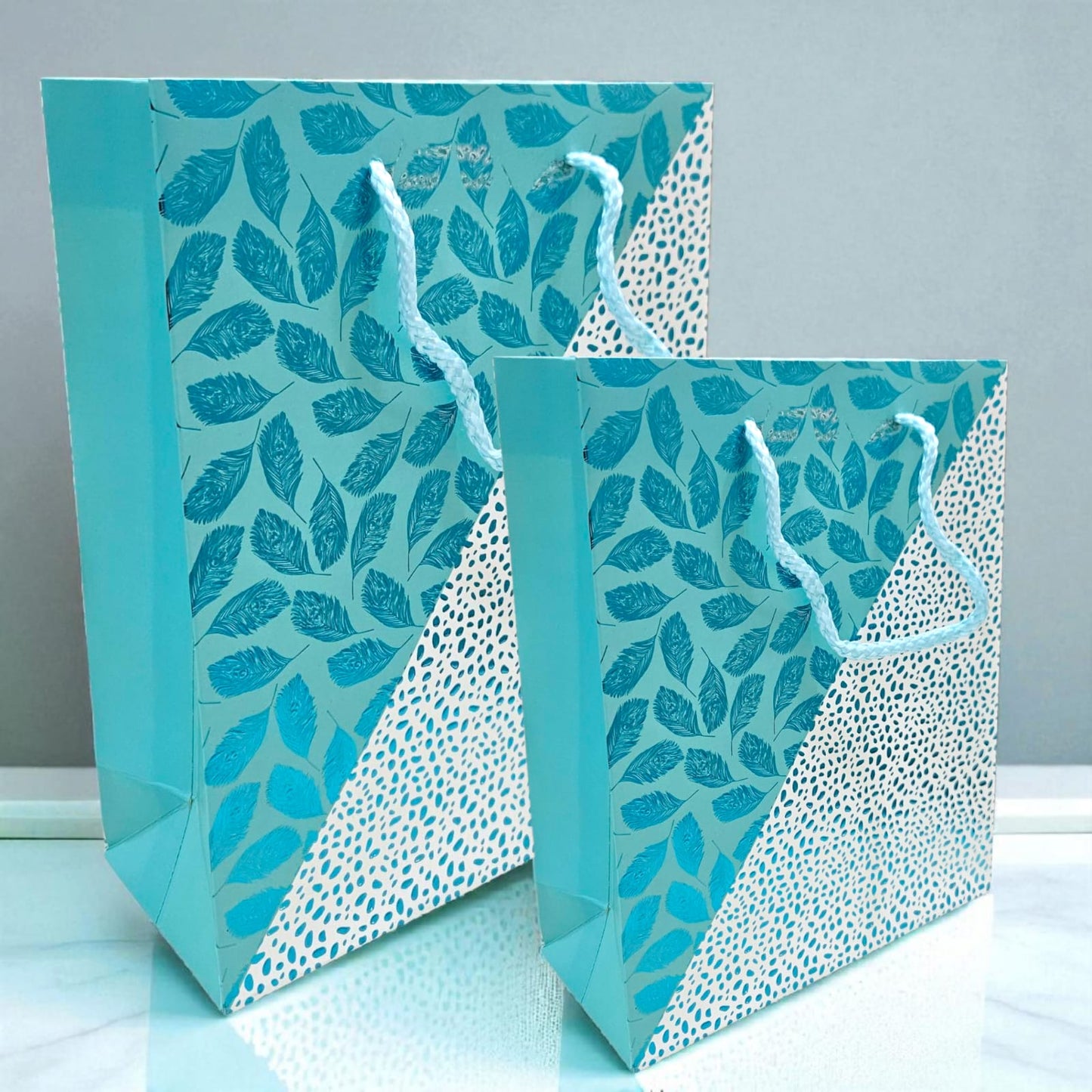 Metallic goodie bag in Turquoise embossed leaves & dots