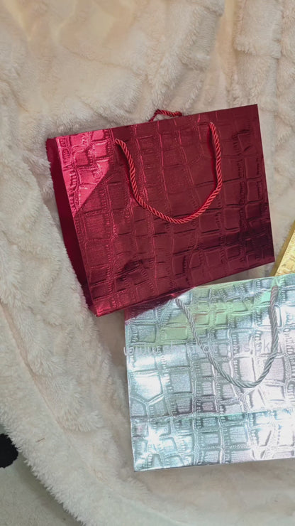Shiny red goodie bag