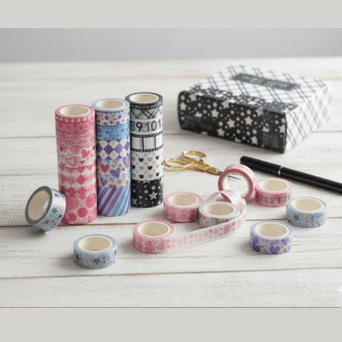 Washi tape box of 18 rolls (XM-JD3064)— 6 rolls (3 cm), 3 rolls (2 cm), 3 rolls (1.5 cm), 3 rolls (1 cm), and 3 rolls (0.5 cm)