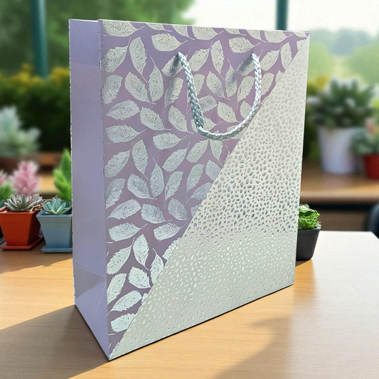 Grey goodie bag with silver Embossed leaves & dots