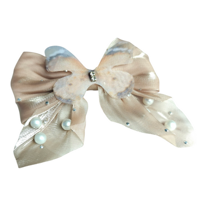 Pair of dull gold butterfly hairbows