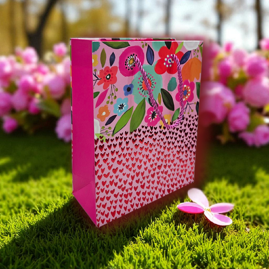 Goodie bag with red metallic hearts embossed