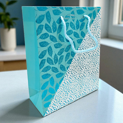 Metallic goodie bag in Turquoise embossed leaves & dots