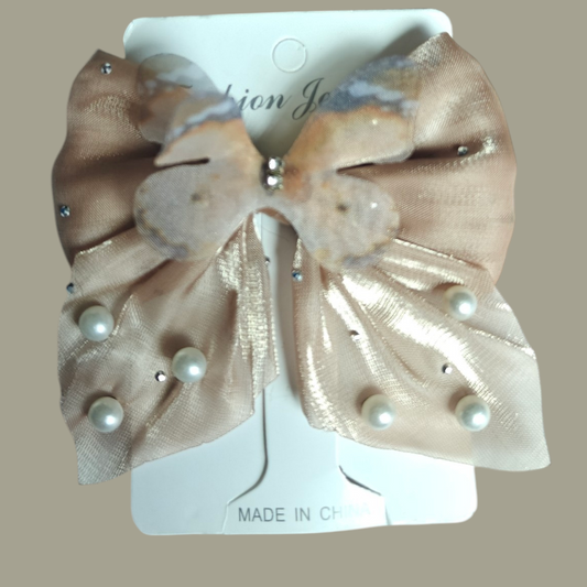 Pair of dull gold butterfly hairbows