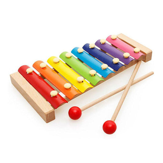 Wooden Hand Knocks The Xylophone